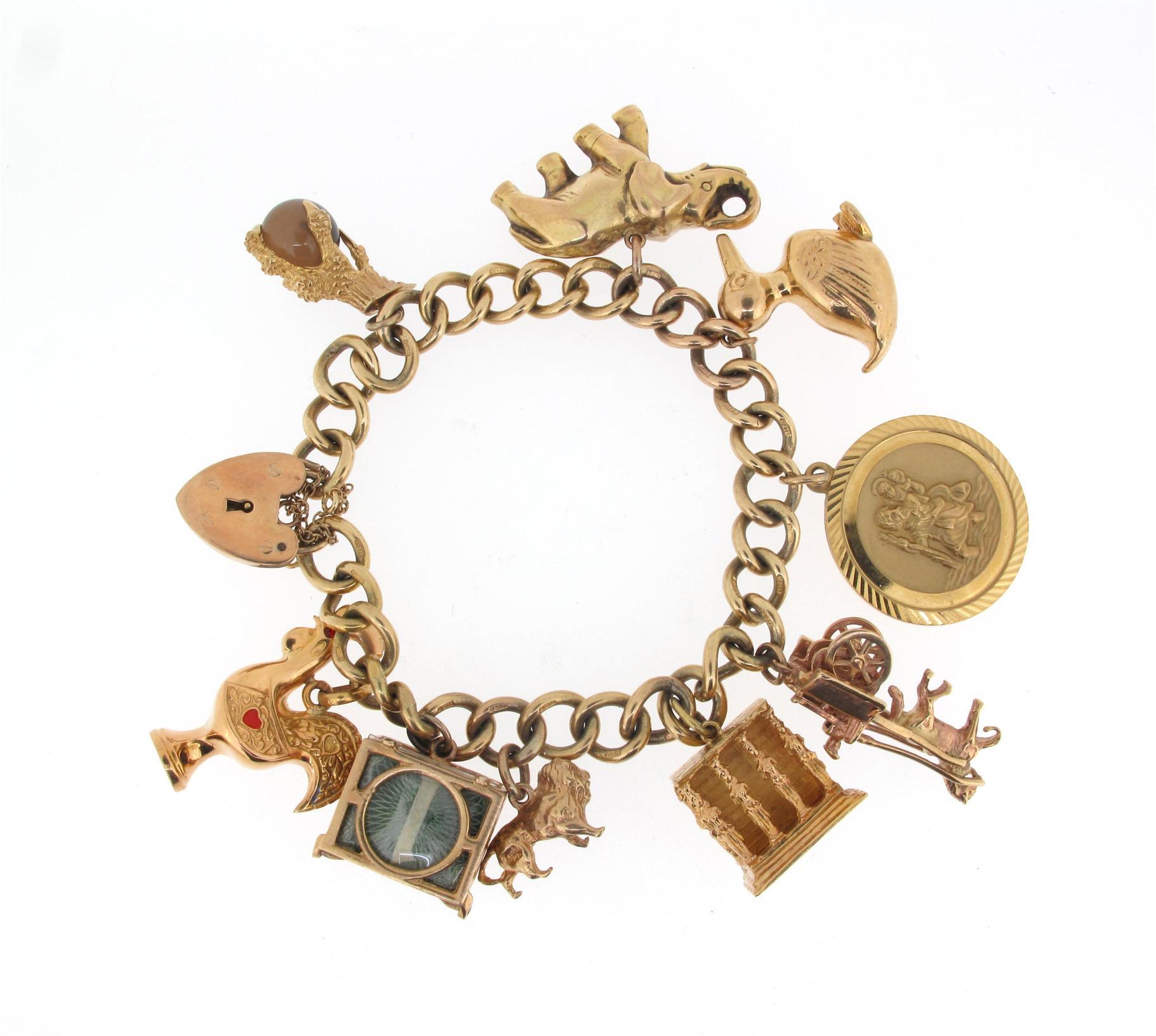 Appraisal: A gold charm bracelet