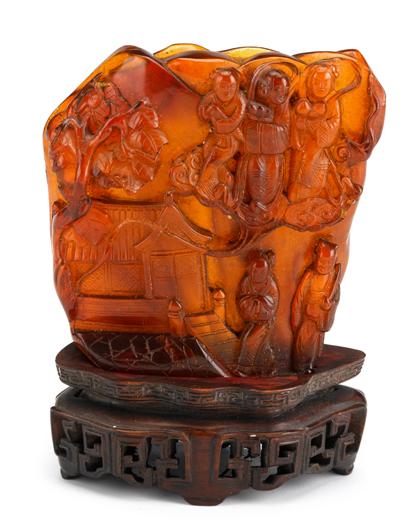 Appraisal: Large Chinese carved amber grouping th century