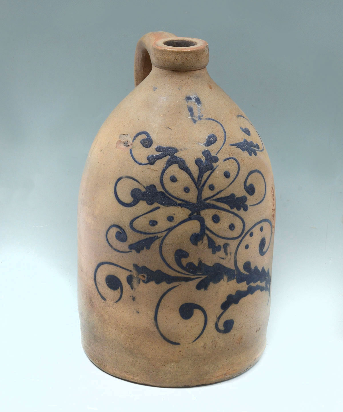 Appraisal: EARLY GALLON SLIP GLAZE JUG Early slip glaze jug having