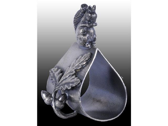 Appraisal: Small Squirrel Atop Pouch Figural Napkin Ring Description Pouch is