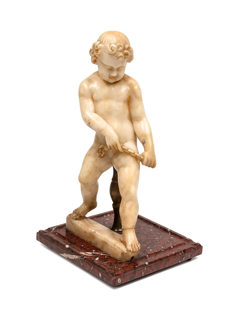 Appraisal: A Continental Carved Marble Figure of a Putto on a