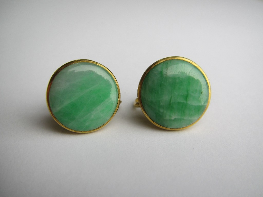 Appraisal: Pair of jade earrings mounted in yellow metal of circular