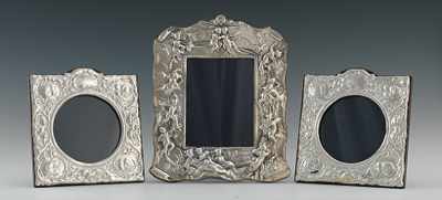 Appraisal: Three Repousse Silver Picture Frames Each repousse frame has Birmingham