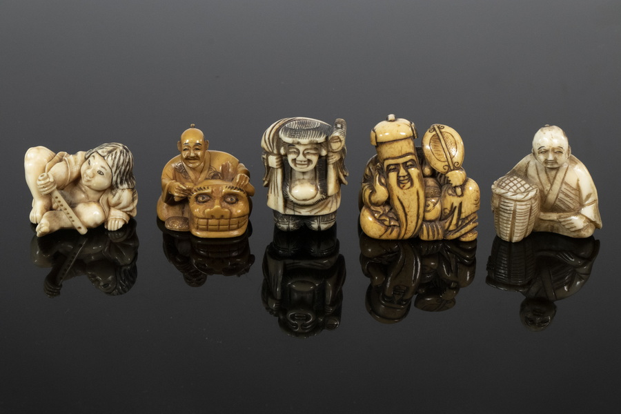 Appraisal: ASSORTED JAPANESE IVORY FIGURAL NETSUKE All of Men to unsigned