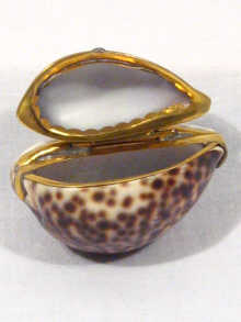 Appraisal: A cowrie shell snuff box mounted in gilt metal circa