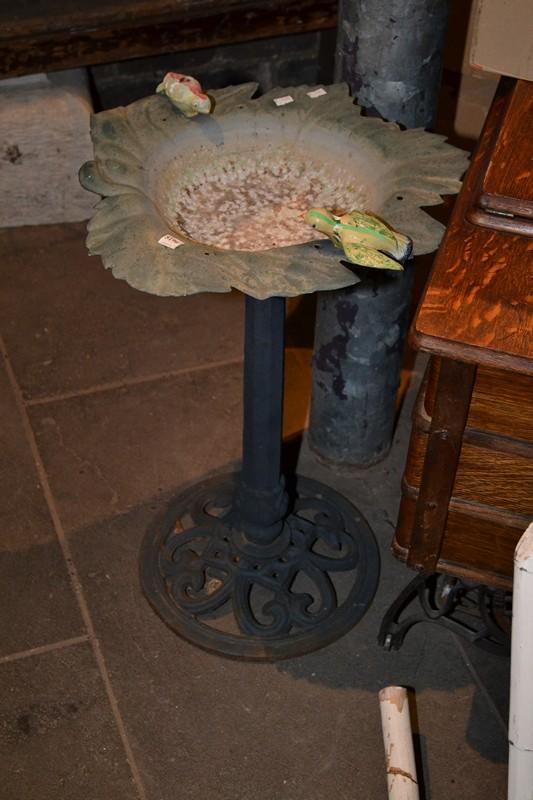 Appraisal: A CAST IRON BIRD BATH A CAST IRON BIRD BATH