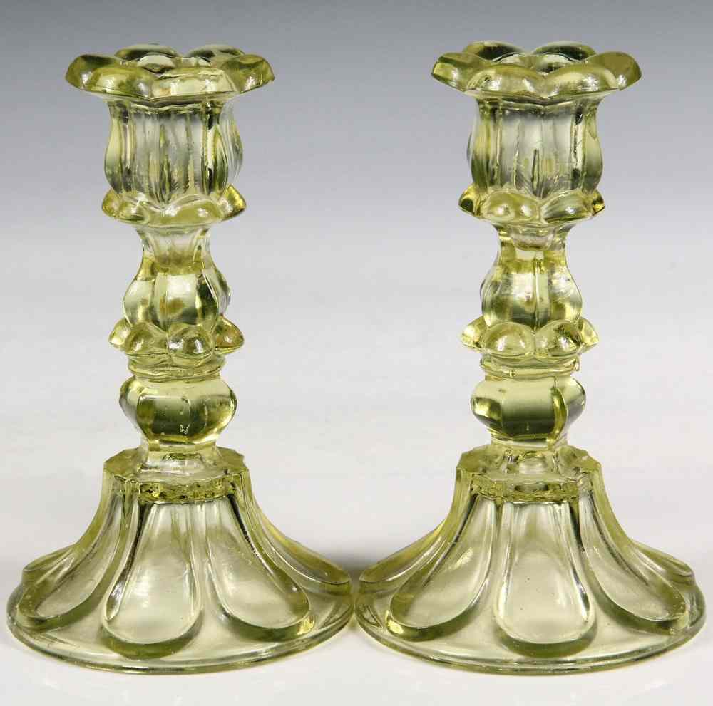 Appraisal: FLINT GLASS CANDLESTICKS - Pair of Canary Yellow Flint Glass