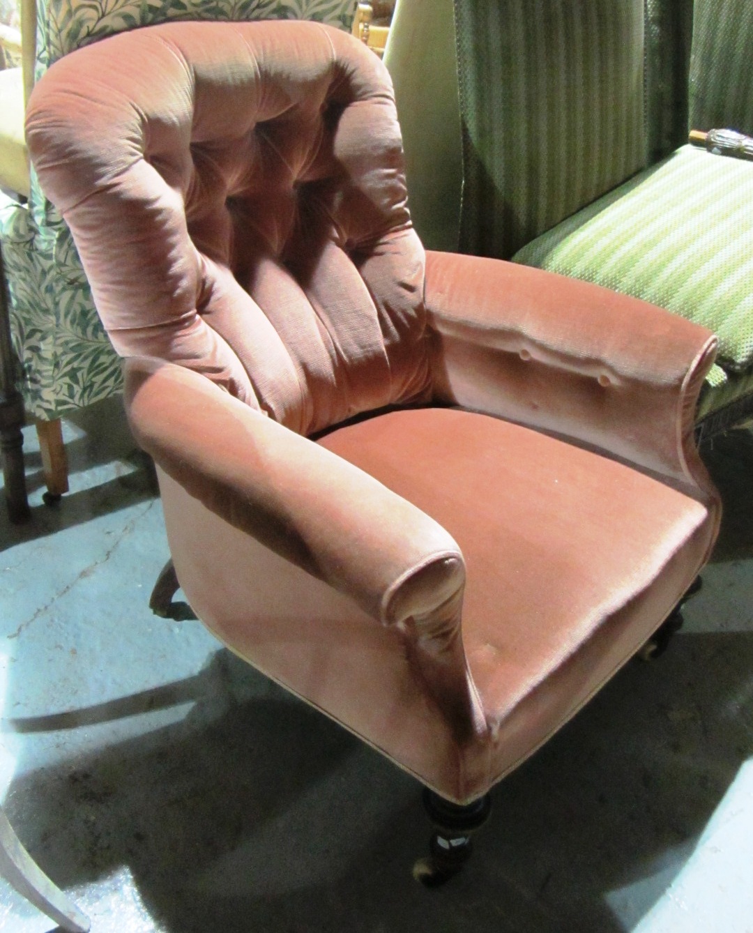 Appraisal: A th century mahogany frame button back chair