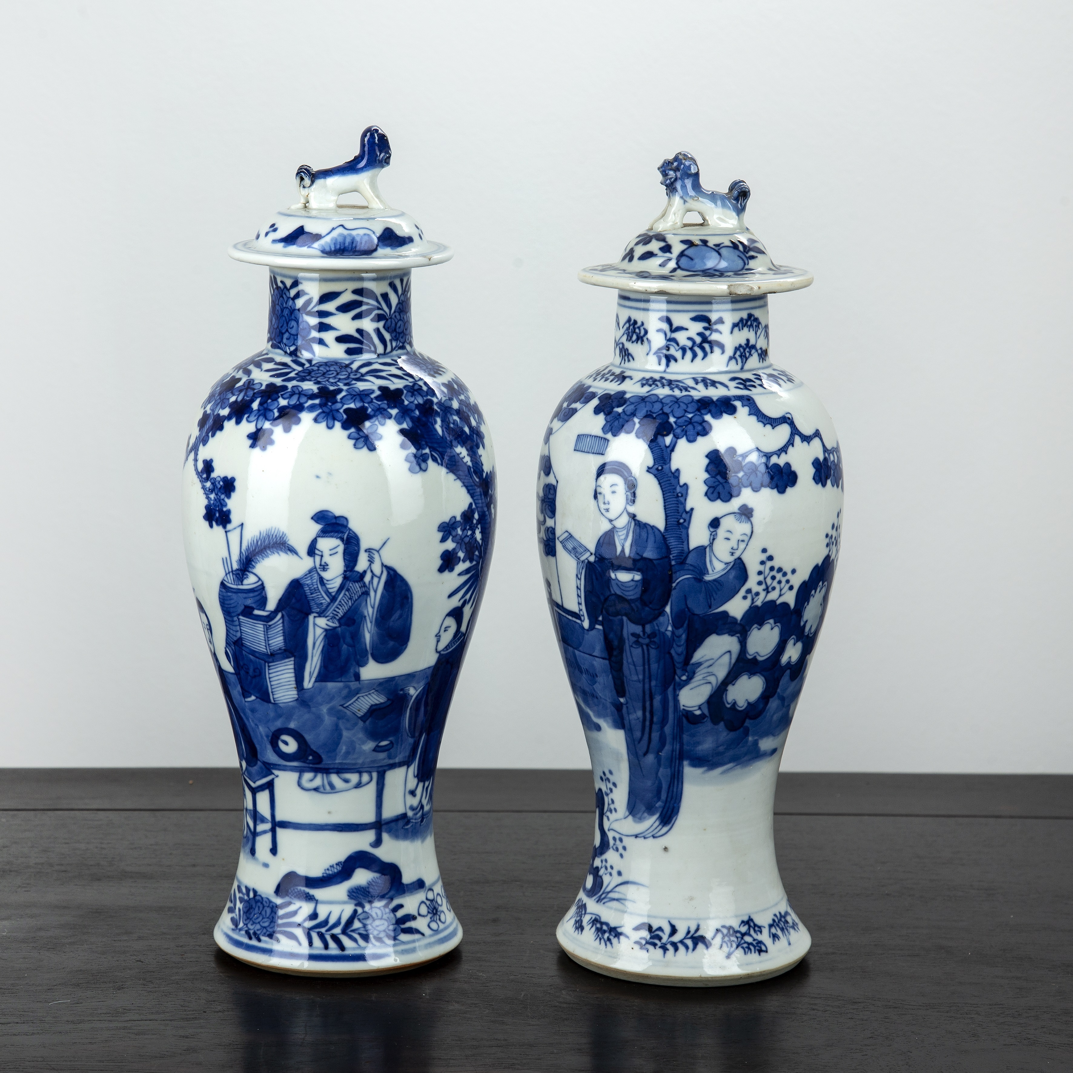 Appraisal: Two similar blue and white baluster vases and coversChinese th