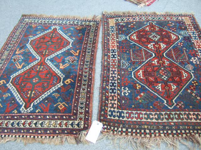 Appraisal: A Shiraz rug the indigo field with a double diamond