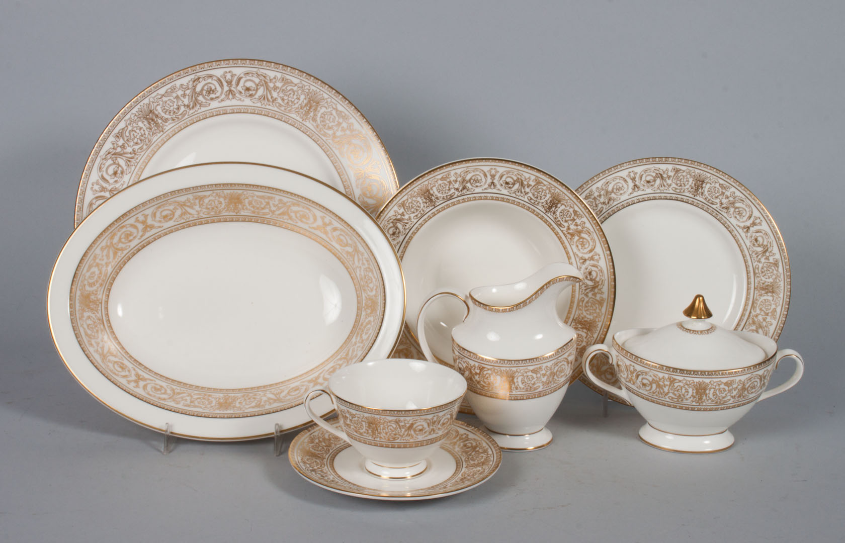 Appraisal: Royal Doulton china partial dinner service in the Sovereign pattern