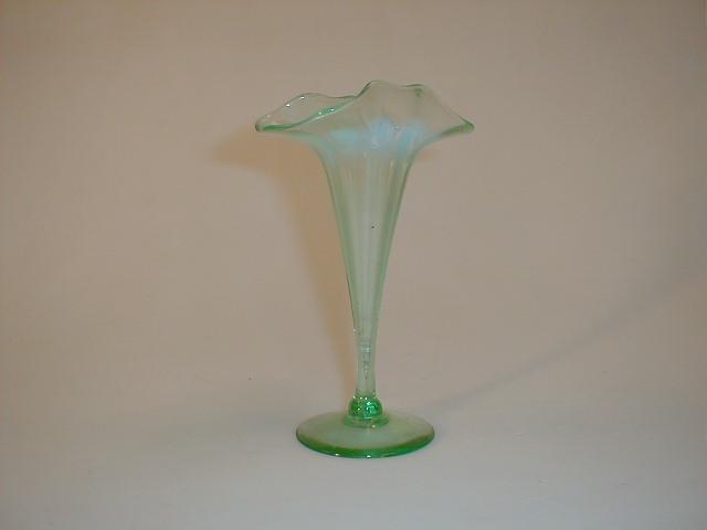 Appraisal: A Victorian flared pale green vase with opalescent ring under