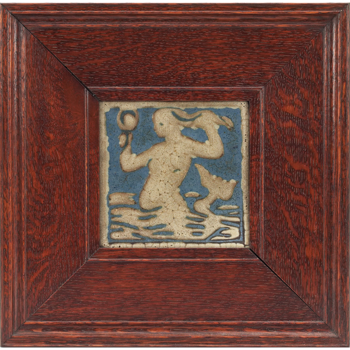 Appraisal: Grueby tile carved mermaid holding amirror gray scene on a