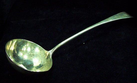 Appraisal: An old English pattern soup ladle crested Charles Boyton Son