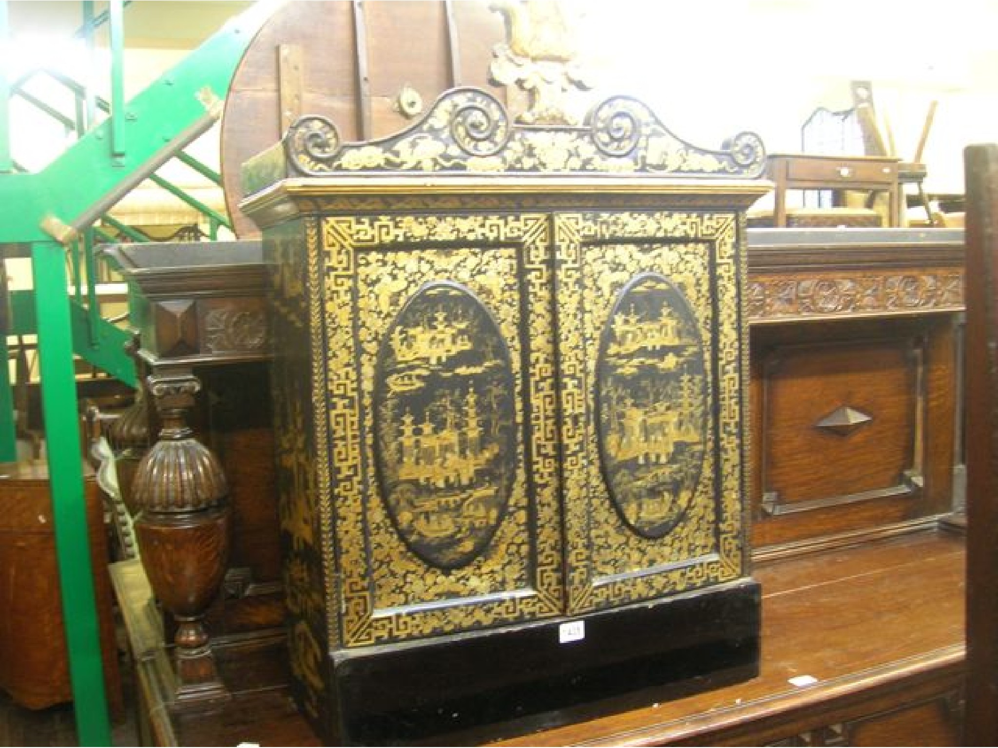 Appraisal: A th century Chinese export lacquered table cabinet enclosed by