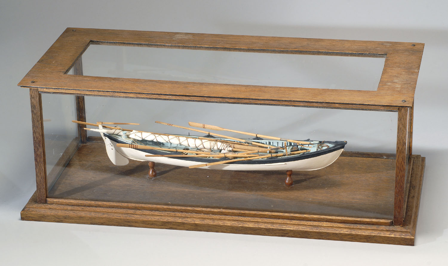 Appraisal: CASED MODEL OF A WHALEBOAT th CenturyPlank-on-frame construction with oars