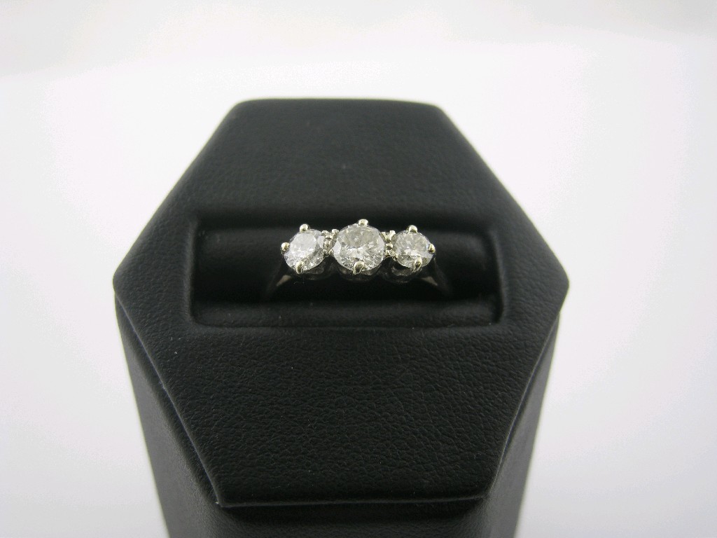 Appraisal: A Diamond three stone Ring the brilliant-cut stones approx total