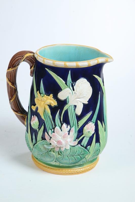 Appraisal: MAJOLICA PITCHER English nd half- th century Iris and waterlily