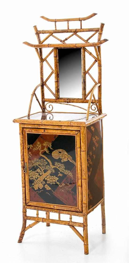 Appraisal: Aesthetic Movement bamboo and lacquer cabinet late th century scorched