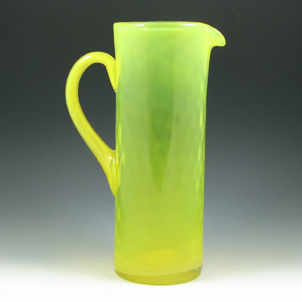 Appraisal: Hand-Blown Art Glass Pitcher Hand-blown art glass pitcher in bright