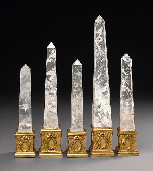 Appraisal: A group of five rock crystal obelisks modern Each of