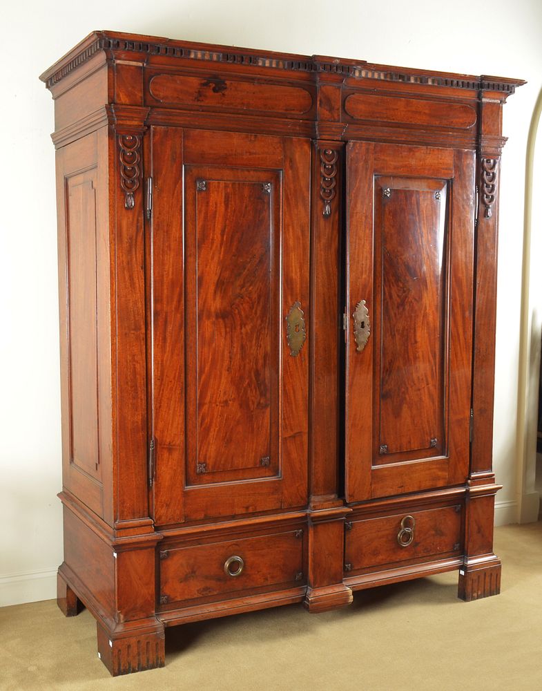 Appraisal: Swedish Neoclassical Carved Walnut Armoire Fitted with two doors and