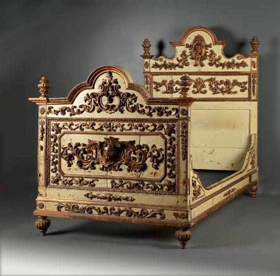 Appraisal: Venetian carved and painted parcel-giltwood bedstead th century with carved