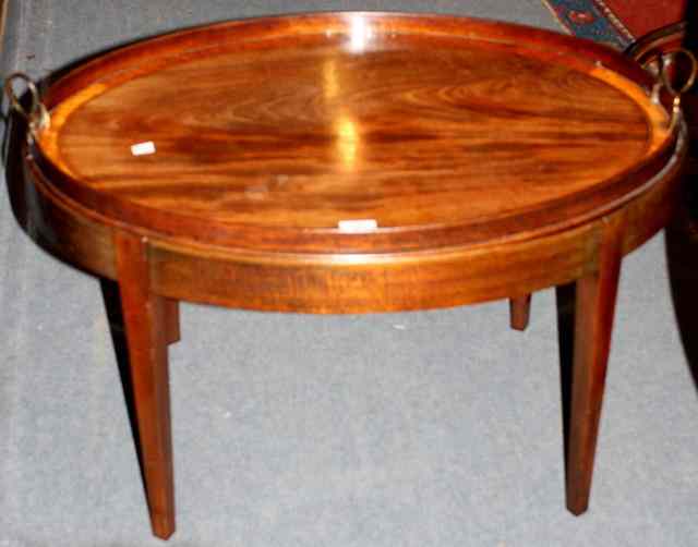 Appraisal: A GEORGE III OVAL MAHOGANY BUTLER'S TRAY the top with