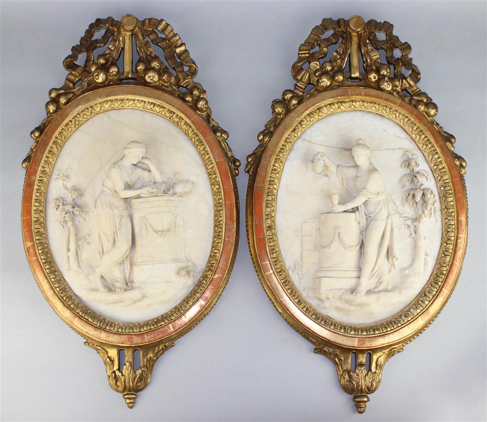 Appraisal: PAIR OF CLASSICAL CARVED HIGH RELIEF ALABASTER OVAL PLAQUES late