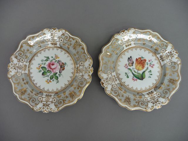 Appraisal: A pair of Ridgway desert plates centrally painted with bouquets