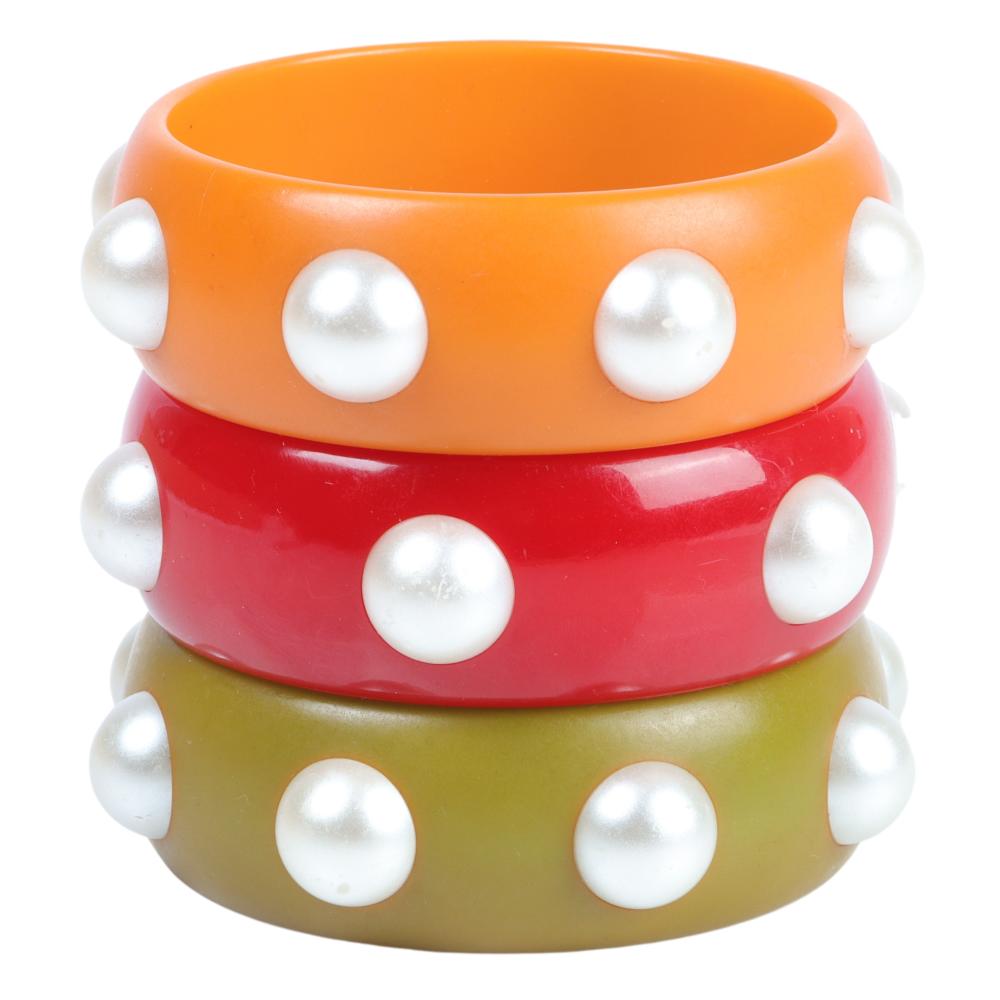 Appraisal: THREE VINTAGE BAKELITE BANGLE BRACELETS WITH FAUX PEARL DOTS INNER