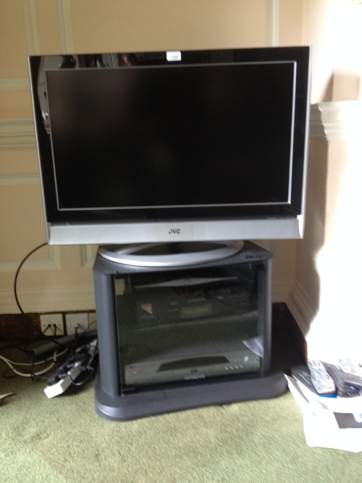 Appraisal: A JVC colour TV DVD VHS players and stand