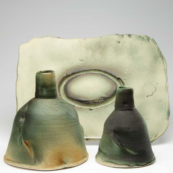 Appraisal: MARIANNE WOO Two dome-shaped ceramic vessels covered in mottled green