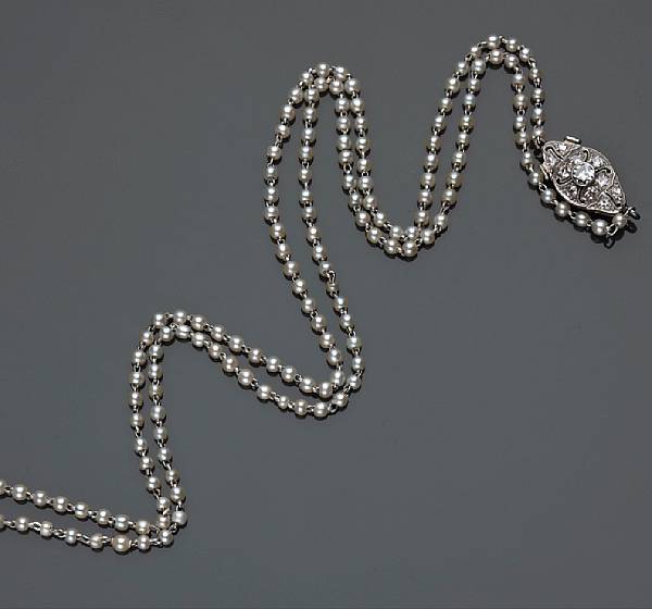 Appraisal: A pearl and diamond necklace pearls measuring approximately mm chain