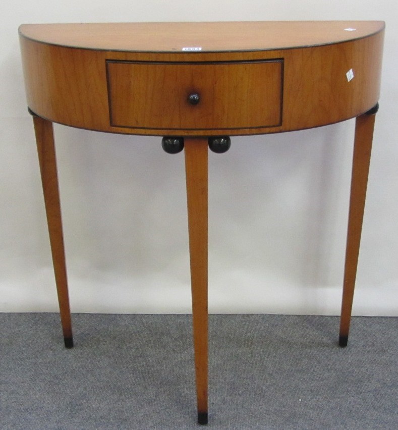 Appraisal: A Biedermeier revival cherry wood semi-elliptic console table with single