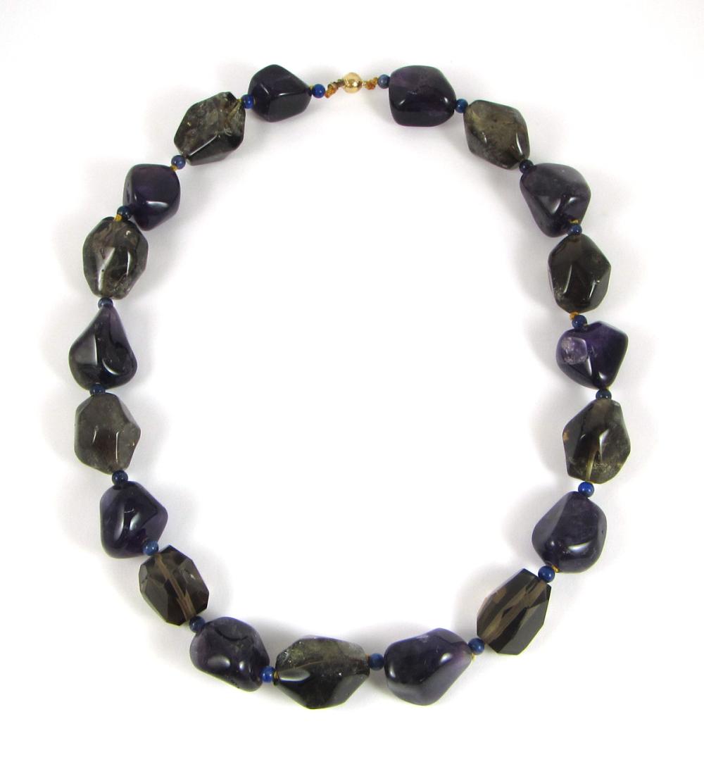 Appraisal: AMETHYST AND SMOKY QUARTZ CHUNKY BEAD NECKLACE - in length