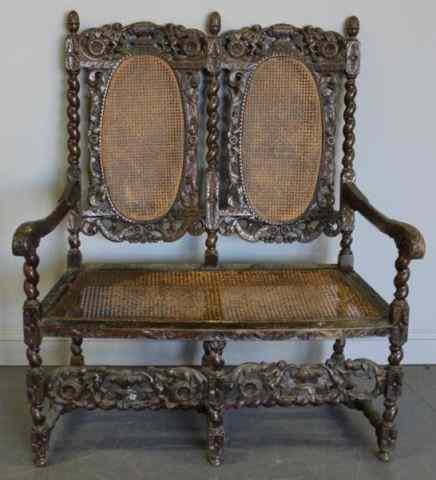 Appraisal: Carved And Caned High Back Bench A dry looking finish