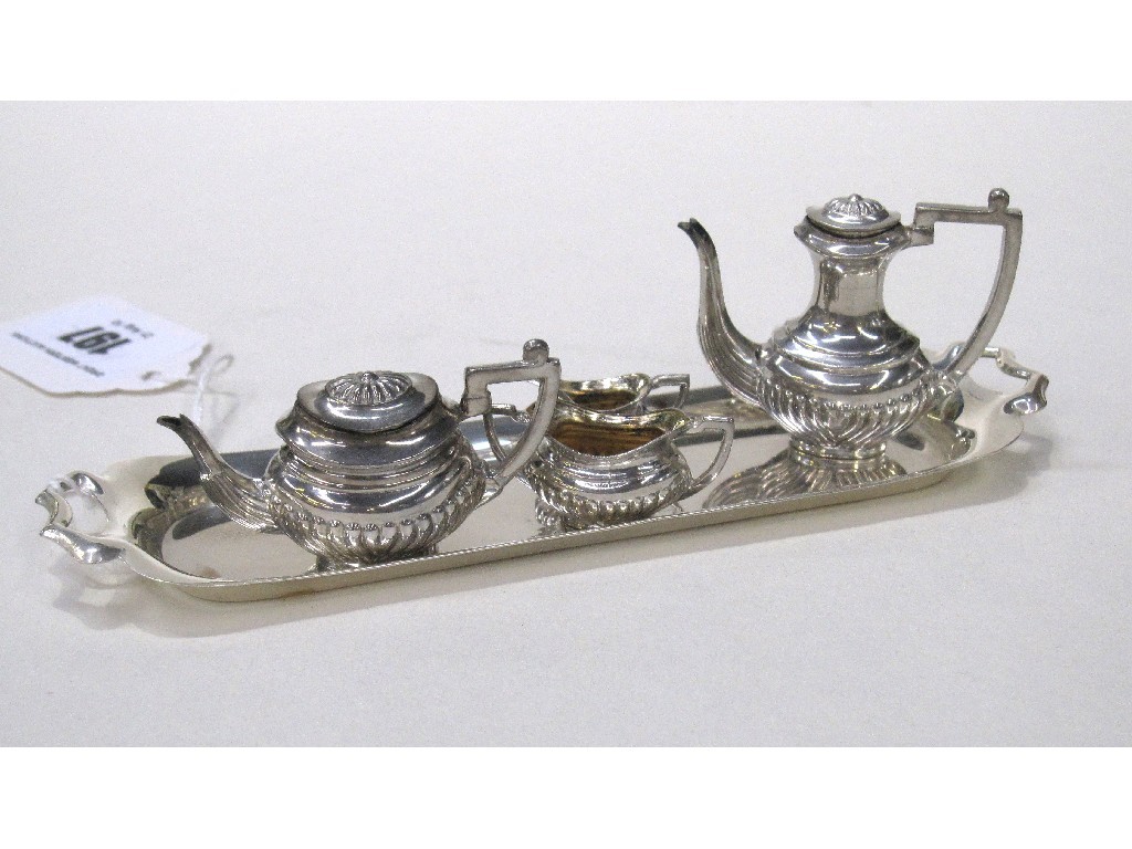 Appraisal: Miniature four piece silver tea service on tray Birmingham