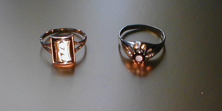 Appraisal: Two gold and stone set dress rings