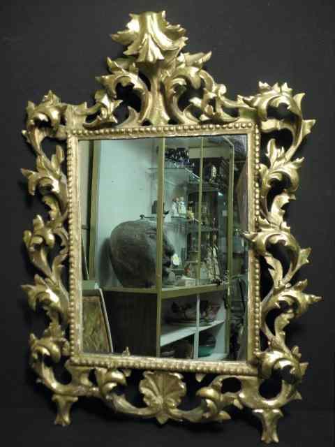 Appraisal: Victorian Rococo revival wall mirror Gilt and carved wood frame