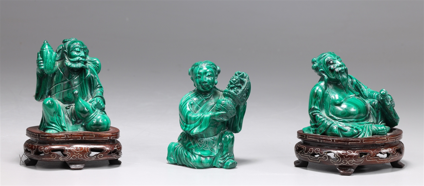 Appraisal: Group of three Chinese malachite carvings each depicting a figure