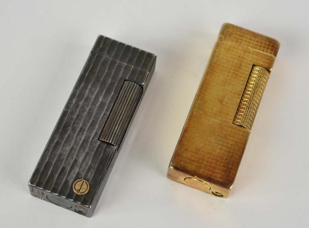 Appraisal: TWO DUNHILL VINTAGE FLINT LIGHTERSBoth marked Dunhill The first with