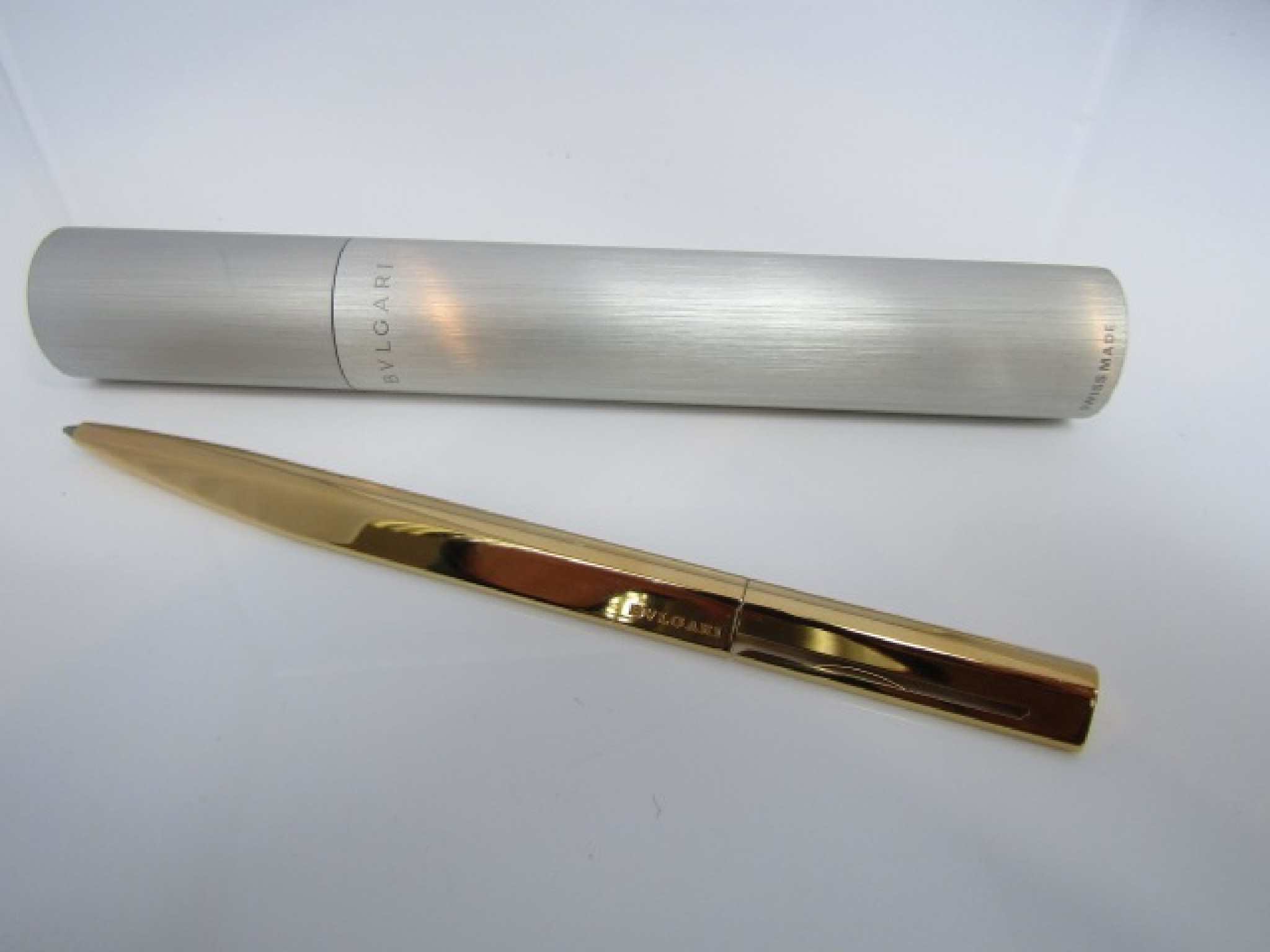 Appraisal: A Bulgari cartridge pen with gold plated casework brushed chrome