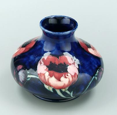 Appraisal: Moorcroft vase red flowers on cobalt ground impressed and blue