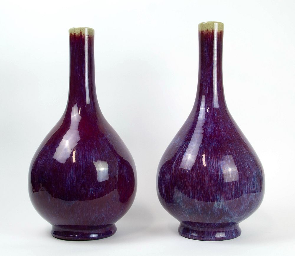 Appraisal: Pair of Flamb Glaze Bottle Vases Each with a beige