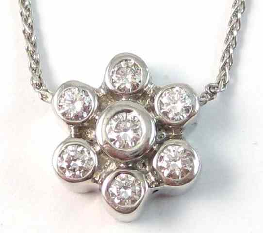 Appraisal: DIAMOND AND WHITE GOLD PENDANT NECKLACE between two lengths of