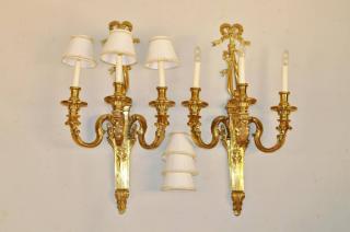 Appraisal: Pair Three Arm Brass Sconces w Ribbon Back Plate Pair