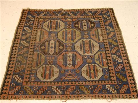 Appraisal: UNUSUAL SQUARE CAUCASIAN RUG Circa with infinite repeat of multi-colored