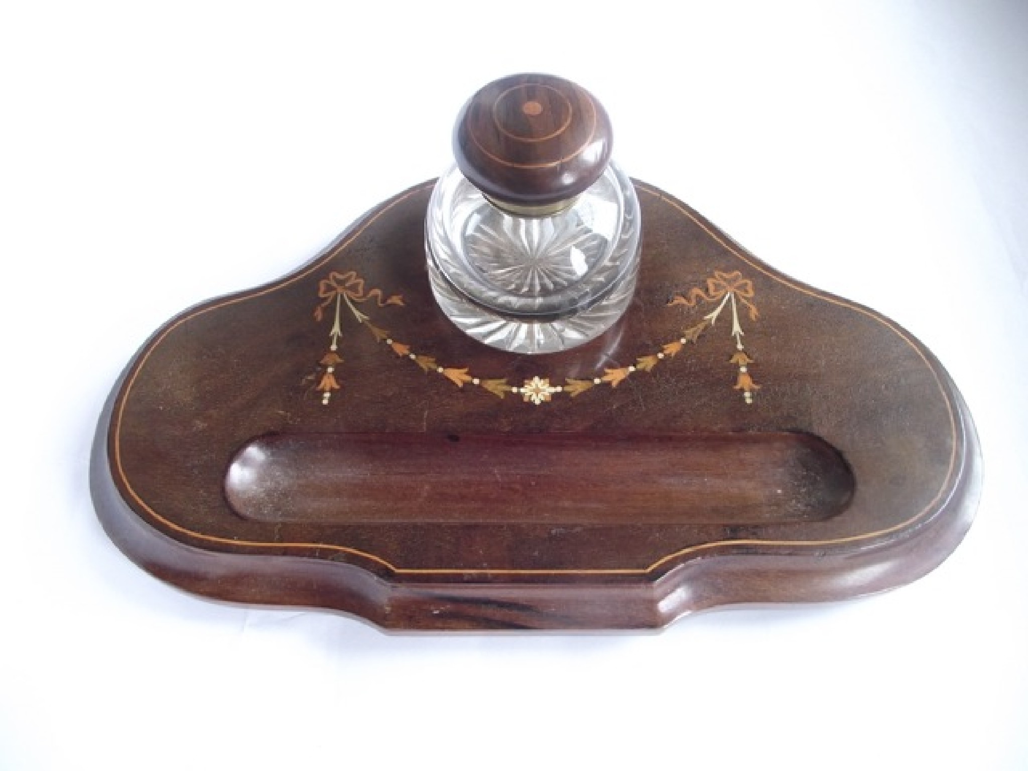 Appraisal: An Edwardian desk standish the mahogany base with inlaid garland