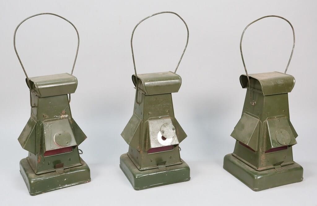 Appraisal: British Ministry of Supply WWII metal hooded blackout lanterns Kerosene